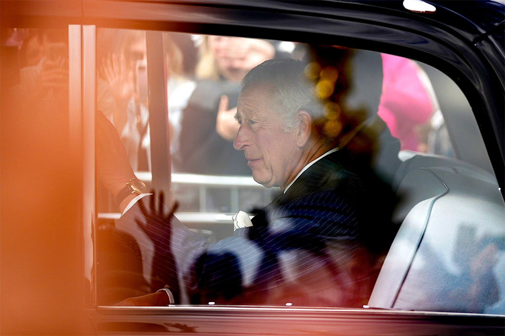 King Charles III arrives at at Buckingham Palace, London, following the death of Queen Elizabeth II (photograph by Zac Goodwin/PA Images/Alamy)